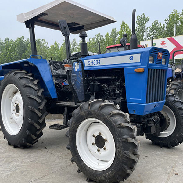 Used Shanghai SH504 50HP compact tractor with dry field tyres Shanghai SH504 50HP compact tractor used for sale
